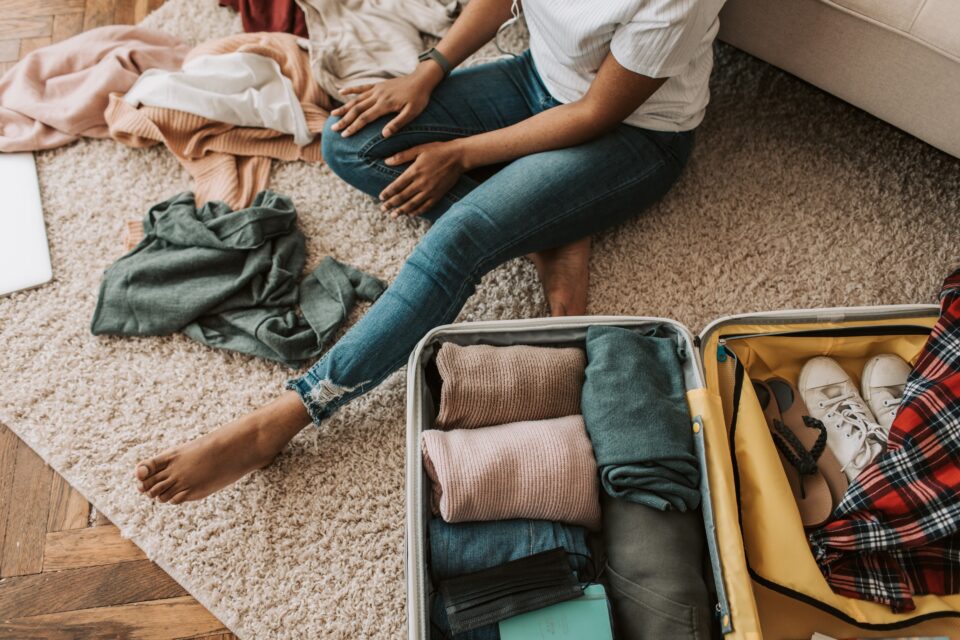 lady packing a suitcase