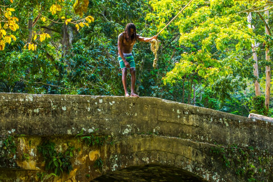 man on beach in jamaica