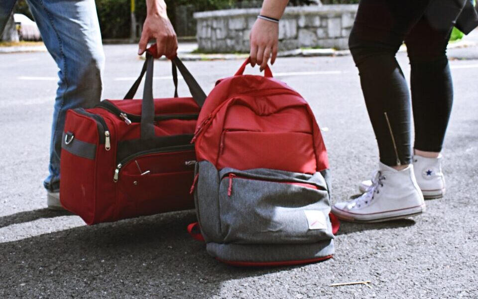 couple picking up a bag