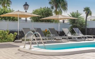 villa pool with umbreelas
