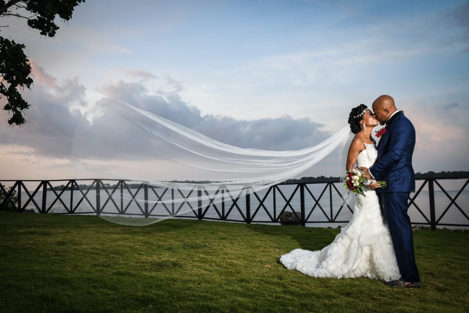 Black couple gettng married on beach